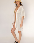 tan Crochet net mesh dress
Collar neckline
Short sleeves
Front button down closures
Unlined/sheer
pool cover up
beach cover up