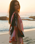 A one-shoulder blouson silhouette mini dress
Crafted from an ethereal viscose chiffon crinkle
Featuring our signature Picasso-inspired print.
Adjustable arm and waist tie