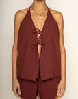 brown Relaxed style halter top
Adjustable halter neck tie
Front and back tie closures
Fully lined