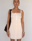 tan Woven coquette mini dress
Front bow detail
Front button closure
Adjustable lace and ribbon shoulder straps
Pintuck details on bodice
Smocked backing
Lined
summer mini dress
spring mini dress