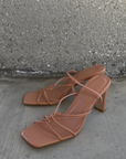 Osara by Billini is a strappy mid block heel.
A must have for all occasions, this strappy barely-there block heel ticks all the boxes.
Featuring
shaved mid block heel
open square toe
thin, tubular strappy upper
elasticated sling back strap
exposed heel counter
synthetic upper, lining and outsole
Heel height 9cm.
