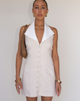 tan cream oatmeal Linen woven halter mini dress
Contrast halter collar
Button down closure
Smocked back
Lined
spring mini dress
summer mini dress