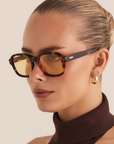 Oversized square sunglasses
Featuring striking yellow lenses paired with a contrasting tortoiseshell frame
Acetate frame
100% UV protection
Gold foil style detailing on inner right arm
Width: 12.9cm / Lens Heigh: 3.67cm / Arm Length: 14cm / Nose Bridge: 1.9cm