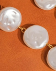 18K Non-Tarnish Pearl Drop Earring
18K Gold Plating Stainless Steel
Faux Pearl Measurement: 3.1inx0.63in
Lead and Nickel Free
Hypoallergenic
Water Resistant