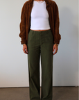 Woven utility pants. Button fly. Four pocket construction. Unlined. green pants. fall outfit.