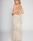 Polka dot printed maxi dress
Tube top
Ruffle on bust trim
Asymmetric ruffle detail on bottom half
Back cut out
Inner rubber grip lining
Side zipper closure
Lined
cream and black polka dot dress
bridal maxi dress