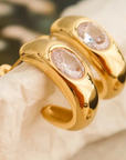 18K Gold Non-Tarnish CZ Classic C Hoop Earring
18K Gold Plating
Stainless Steel
Cubic Zirconia (CZ)
Measurement (L x W inch): 0.8 x 0.7
Lead-free
Nickel-safe
Hypoallergenic
Water Resistant