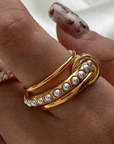 18K Gold Non-Tarnish Multi Stack Pearl Band Ring
18K Gold Plating
Stainless Steel
Size 8 Measurement: 0.714 Diameter/2.24 Circumference
Lead-free
Nickel-safe
Hypoallergenic
Water Resistant