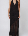 Polka dot halter maxi dress
V-neckline
Adjustable neck tie
Low back
Asymmetrical sheer hemline
Partially unlined/Sheer
black and white polka dot maxi dress