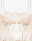 cream Sleek satin bustier with lace detailing
Fully boned bodice
Adjustable lace-up back
Skinny tie bow
Rosette adornments
Lined at cups
Adjustable shoulder straps
Polyester/Elastane
cream ligneire bustier top