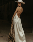 Satin maxi dress. Fixed halter strap. Elastic back strap. Fully lined. ivory satin maxi dress.