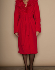 Faux sherpa longline coat. Faux fur collar neckline. Front snap button closure. Tie waist. Side pockets. Back slit. Fully lined. red fur coat. fall outfit. cute winter coat. trendy winter coat.
