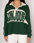 Graphic printed knit top. Collar neckline. Long sleeves. Unlined. green graphic long sleeve tee. bonjour tee