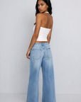 Mid-rise, loose fit with a full-length baggy leg profile
Rolla's signature back pocket stitching vintage logo button
Button fly zip closure
light to medium wash denim jeans
rollas jeans