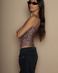 Animal printed knit mesh crop top. Twisted fixed straps. Raw edge hem. Fully lined/sheer. leopard print tank top. cheetah print tank top. going out top.