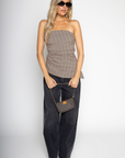 Plaid asymmetrical tank top
Asymmetrical hemline
Inner rubber grip lining
Adjustable/removeable straps
Side zipper closure
Lined
brown plaid tank top
brown plaid tube top
fall top
fall outfit