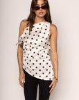 Satin polka dot tunic top
One shoulder
Asymmetrical hemline
Twisted shoulder strap
Side zipper closure
Unlined
white and brown polka dot one shoulder top
going out top
polka dot top
