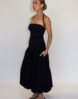 black Bubble halter maxi dress
Adjustable tie straps
Knit bodice
Woven skirt
Elastic neckline
Ruched sides
Side pockets
Fully lined