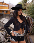 black Floral embroidered faux suede micro shorts. coachella shorts outfit. stagecoach shorts outfit. festival shorts outfit.