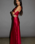 Satin maxi dress. Adjustable straps with rosette details. Side hook and eye and zipper closures. Unlined. red maxi dress. holiday look. holiday inspo. holiday outfit