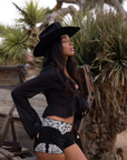 black Floral embroidered faux suede micro shorts. coachella shorts outfit. stagecoach shorts outfit. festival shorts outfit.