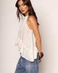 Woven halter top
Frilled trim
Adjustable neck tie
High to low trim
Unlined
cream boho top