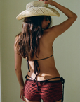 brown and orange striped booty shorts
festival outfit
coachella outfit
stagecoach outfit