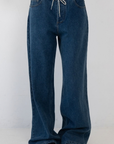 blue Wide leg denim pant
Hidden waistband with adjustable drawstring
5 pocket construction
Button closure
Unlined
Cotton/Polyester