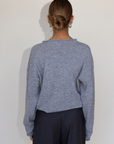 Fuzzy heather crochet knit sweater. Henley quarter neckline with button down closures. Long sleeves. Unlined. brown pullover. grey sweater. fall sweater. fall outfit