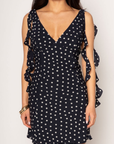 Polka dot chiffon mini dress. Adjustable straps. Back hook and eye and zipper closures. Fully lined. Ruffle trim. polka dot mini dress. summer dress. spring dress.