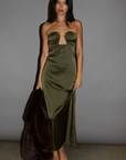 Satin maxi dress. Strapless elastic neckline with inner rubber grip lining. Front wire detail. Side hook and eye and zipper closures. Unlined. olive maxi dress. holiday look. holiday outfit. holiday dress. christmas outfit. christmas dress. new years dress.