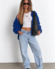 blue Fuzzy knit cardigan
Crewneck
Front button down closures
Long sleeves
Unlined
dodger blue sweater