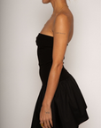 Strapless dress. Knit bodice. Woven skirt. Elastic neckline. Inner rubber grip lining. Side hook and eye and zipper closures. Unlined. Black mini dress. fall dress. holiday dress. friendsgiving dress. thanksgiving dress. summer dress. little black dress