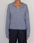 Fuzzy heather crochet knit sweater. Henley quarter neckline with button down closures. Long sleeves. Unlined. brown pullover. grey sweater. fall sweater. fall outfit