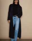 Super high rise straight leg jeans button and zipper fly. Five pocket construction. medium wash denim jeans. light wash denim jeans
