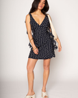 Polka dot chiffon mini dress. Adjustable straps. Back hook and eye and zipper closures. Fully lined. Ruffle trim. polka dot mini dress. summer dress. spring dress.