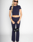 blue lounge set
fall lounge set
TOP
Button down short sleeve top
Round neck
Button down closure
Jersey knit
Unlined
Length: 17.5"
Polyester/Spandex
BOTTOM
Flare pant
Fold over waist
Low rise
Jersey knit
Unlined
Waist: 28" Length: 39.5" Rise: 9"
Polyester/Spandex