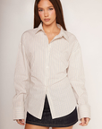 Striped button down shirt
Adjustable lace up back
Collared
Unlined