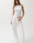 Cut to sit low on the hips
Relaxed rise
Easy adjustable drawstring waist tie
Wide, fluid leg
Constructed from non-stretch denim
Size 26 measurements:
Rise: 11" / Inseam: 32 1/2" / Leg Opening: 24"
Cotton/Lyocell
white denim jeans