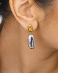 gold and silver 18K Non-Tarnish Classic Drop Earring
18K Gold Plating
Stainless Steel
Measurement (L x W inch): 1.33in x 0.49in
Lead-free/Nickel-safe/Hypoallergenic/Water Resistant