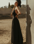 Woven maxi dress. Adjustable crisscross back straps. Back hook and eye and zipper closures. Fully lined. black maxi dress. country outfit. country dress. western outfit. western dress.