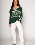 Graphic printed knit top. Collar neckline. Long sleeves. Unlined. green graphic long sleeve tee. bonjour tee