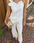 white Linen pant
Lace on sides and trim
Elastic waistband
Unlined
Partially sheer
hamptons east coast outfit