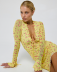 yellow Floral printed long sleeve mini dress
Deep v neckline
Ruffle trim
Tie keyhole
Fully lined in our soft mesh fabric