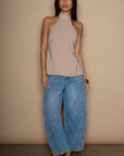 Barrel leg jeans. Button fly. Five pocket construction. Unlined. medium wash jeans.