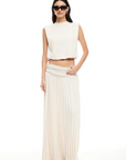 Knit maxi skirt. Elastic wide waistband. Pleated skirt. Fully lined. Slightly sheer. white mxi skirt. white lioness skirt.
