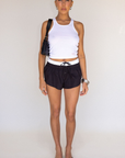 black Flare micro shorts
Adjustable waist tie
Color block waist band
Faux button down
Unlined
summer shorts
cute lounge shorts