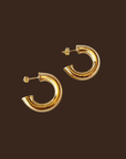 18k Gold filled 25mm chubby C-hoop earrings.
Metal: 18k gold-filled
Size: 25mm diameter
Thickness: 6.7 mm wide tube
Hypoallergenic
Nickel Free
Water-resistant
gold hoop earrings