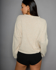 Fuzzy knit cardigan. Crewneck. Front button down closures. Long sleeves. Unlined. tan cardigan. fall cardigan. fall outfit. layering piece