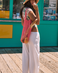 Woven pants. Elastic waist with drawstring closure. Side pockets. Unlined. white linen pants. white woven pants. throw on pants. beach pants. beach cover up. european summer. Cute casual outfit. Cute casual pants. beach outfit